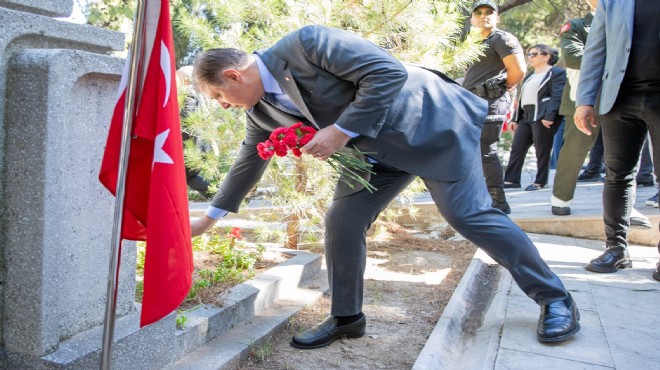 Başkan Tugay’dan şehitlerin kabrine karanfil